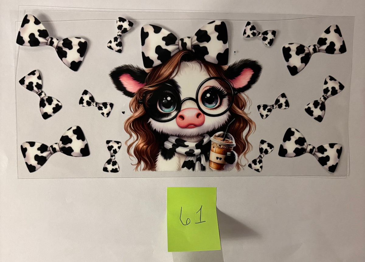 61 Girl Highland Cow with black and white bows
